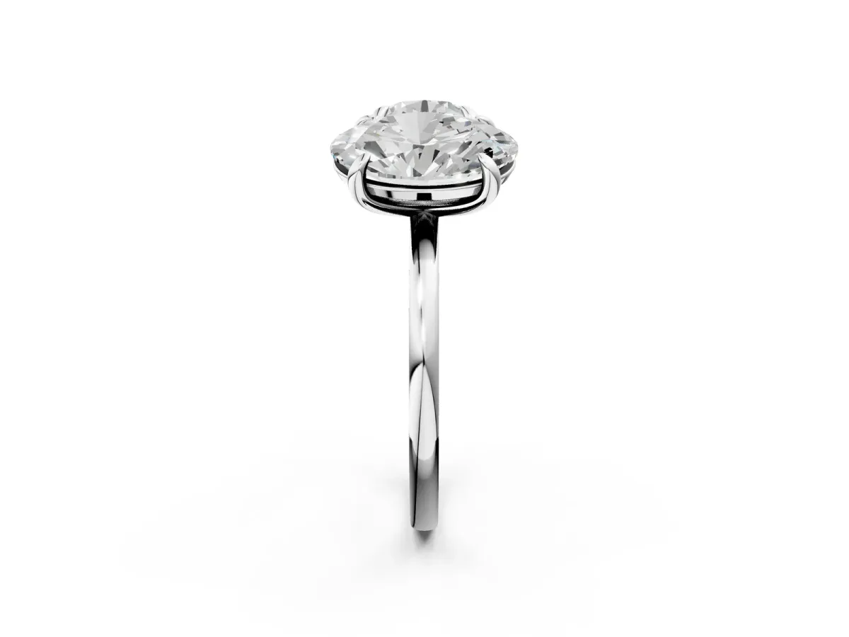 Round and Oval Toi Moi Ring with Prong Setting and Plain Band Platinum