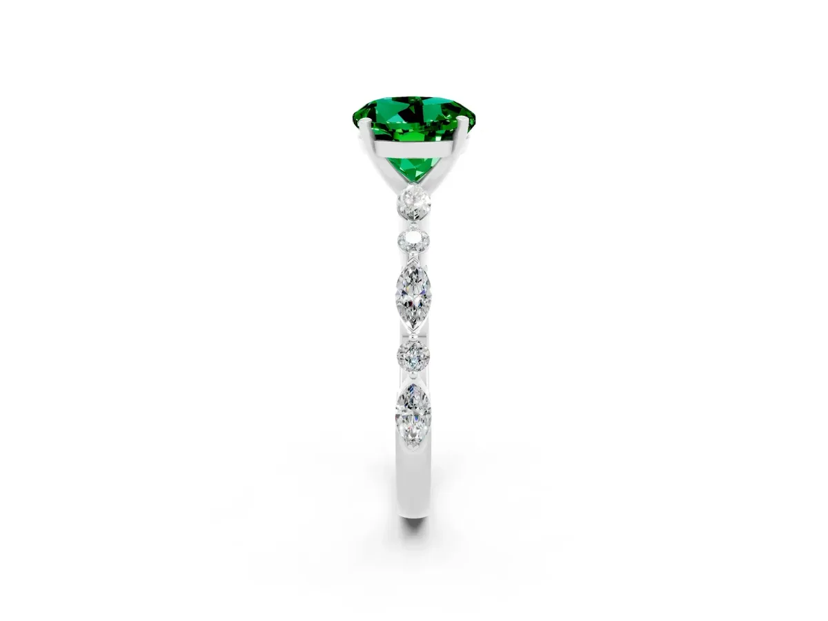 Round Cut Emerald Ring with Marquise and Round Side Stones and Four-Prong Setting Silver