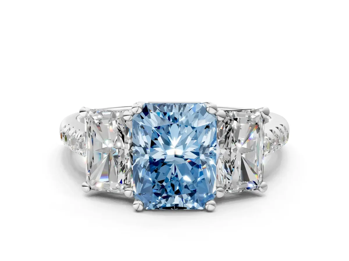 Fancy Blue Three-Stone Radiant Cut Diamond Ring with Round Pavé Band and Prong Setting Silver