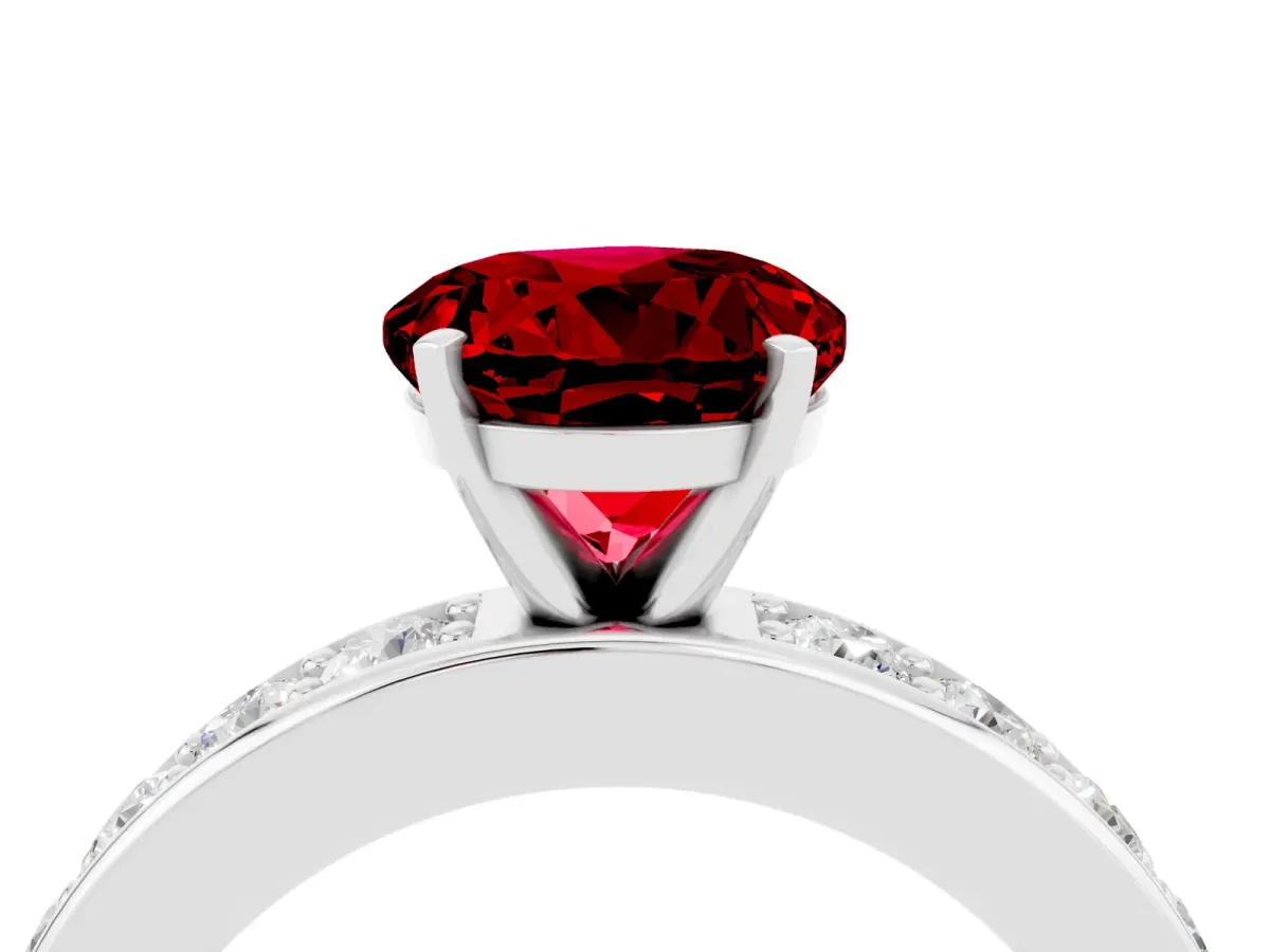 Round Cut Ruby Engagement Ring with Channel Set Round Band and Prong Setting White gold