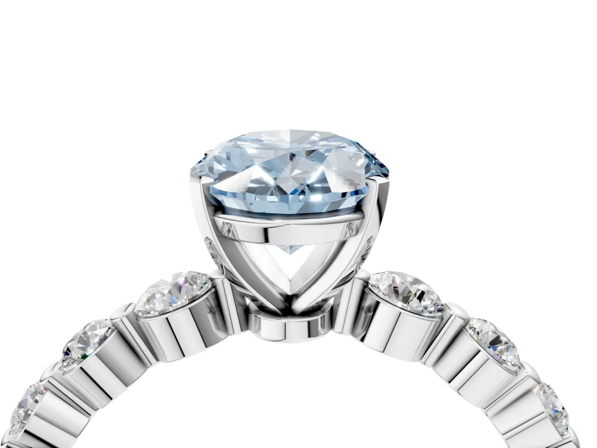 Fancy Blue Oval Cut Solitaire Diamond Ring with Pave Band and Four-Prong Setting Platinum