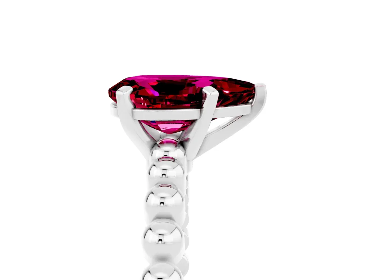 Pear Cut Garnet Solitaire Ring with Beaded Band and Prong Setting Silver