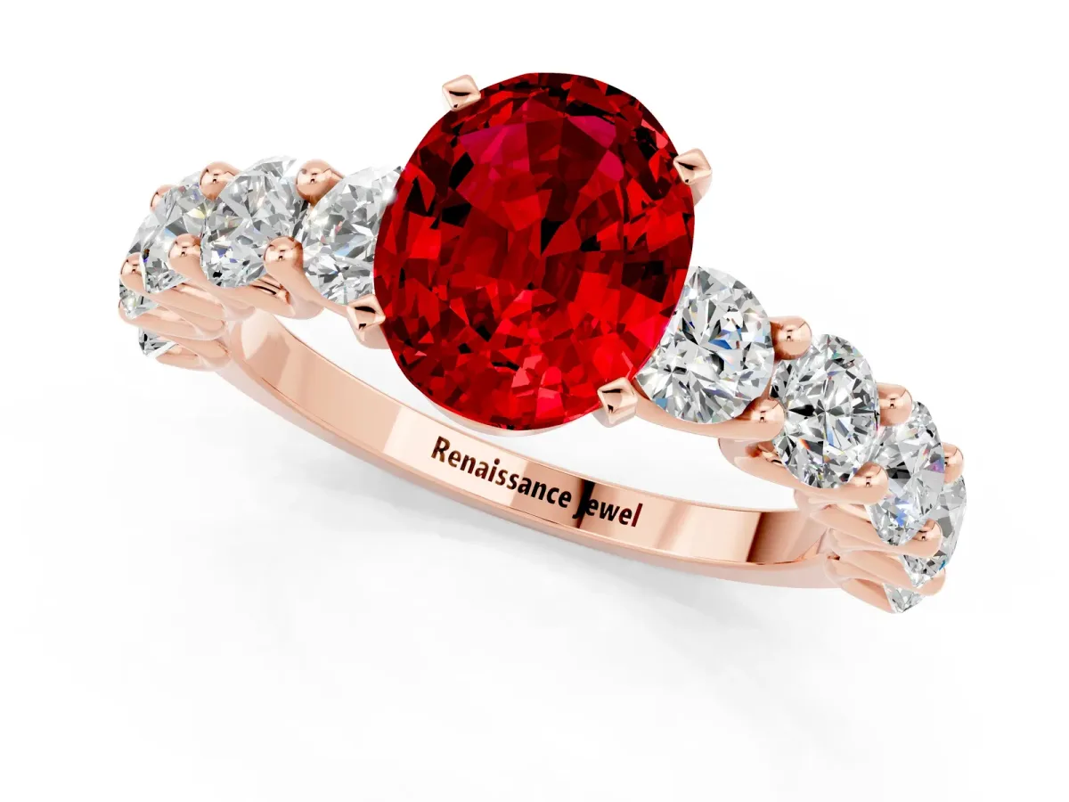 Oval Cut Ruby Prong Setting with Side Stones on a Pave Band Rose gold