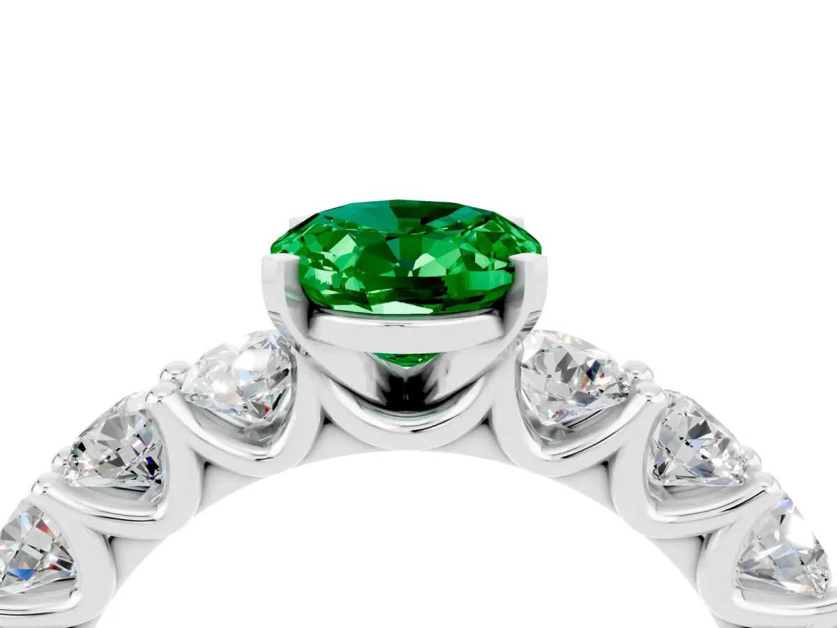 Oval Cut Emerald Prong Setting with Side Stones on a Pave Band Platinum