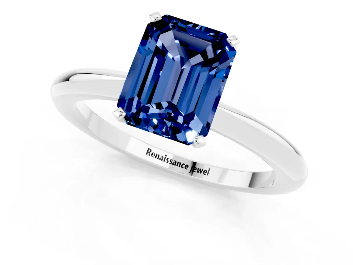 Emerald Cut Blue Sapphire Solitaire Ring with Six-Prong Setting and Classic Band Platinum