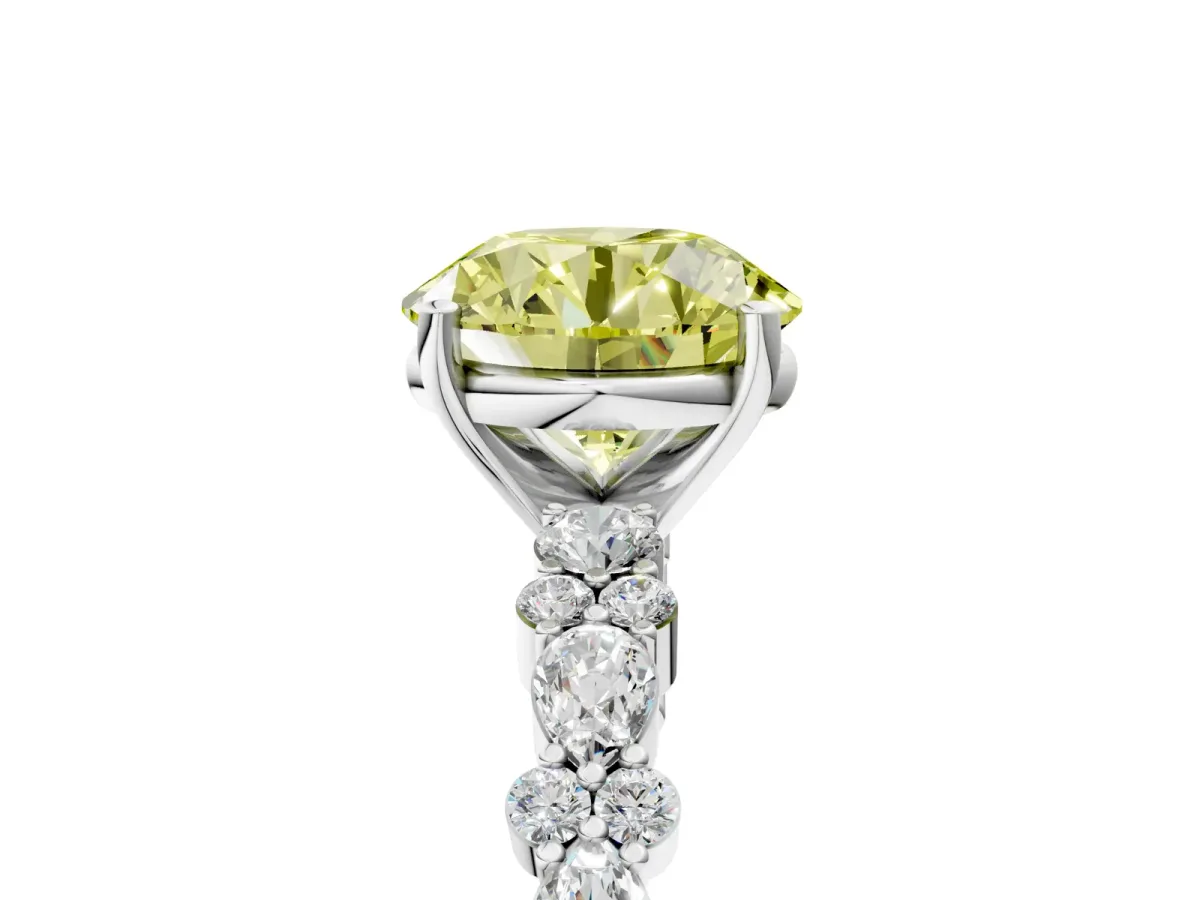 Fancy Yellow Round Cut Diamond Side Stone Solitaire Ring with Round and Four-Prong Setting White gold