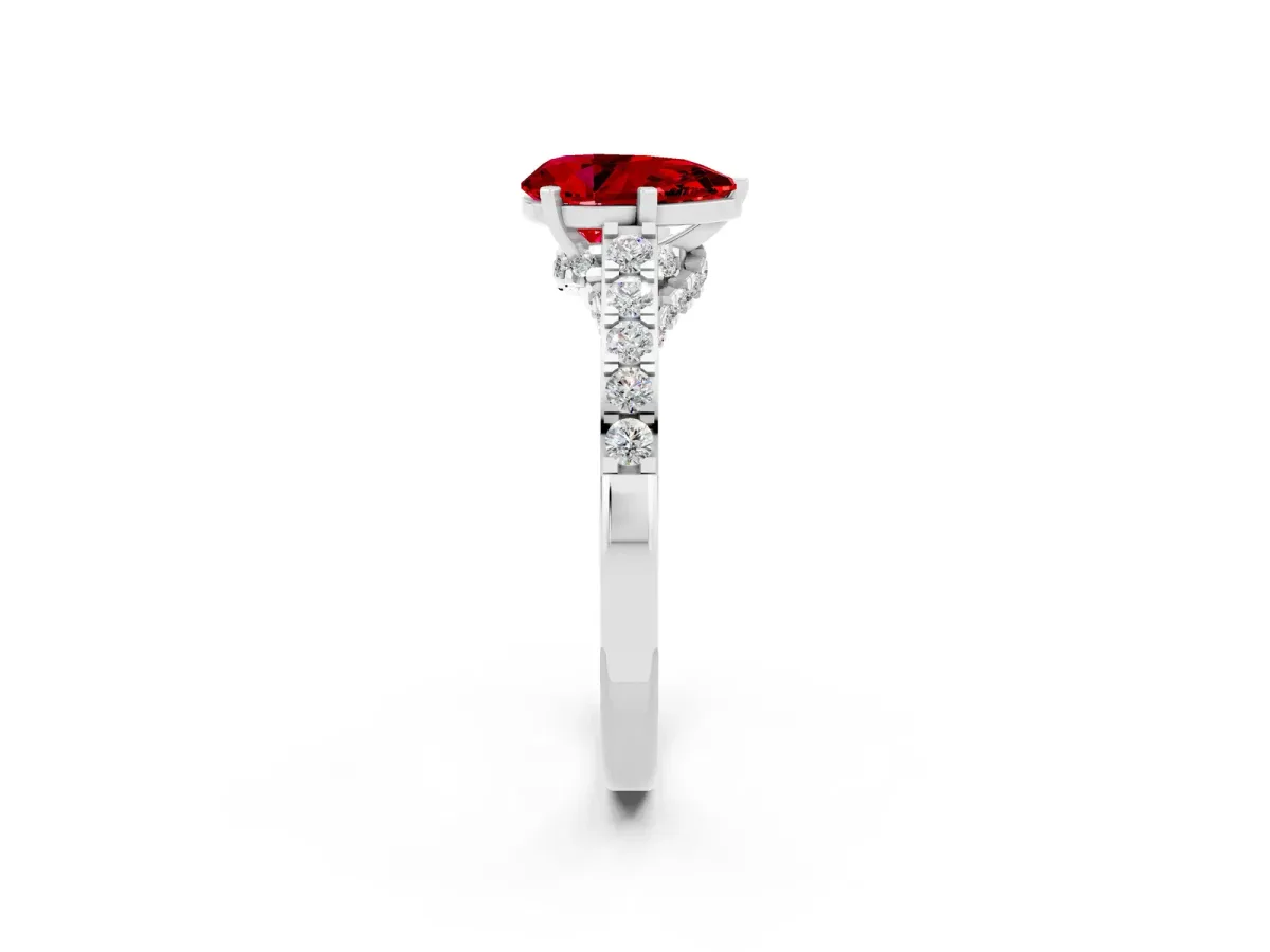 Pear Cut Ruby Solitaire Ring with Crossover Gallery and Round Pavé Band Platinum