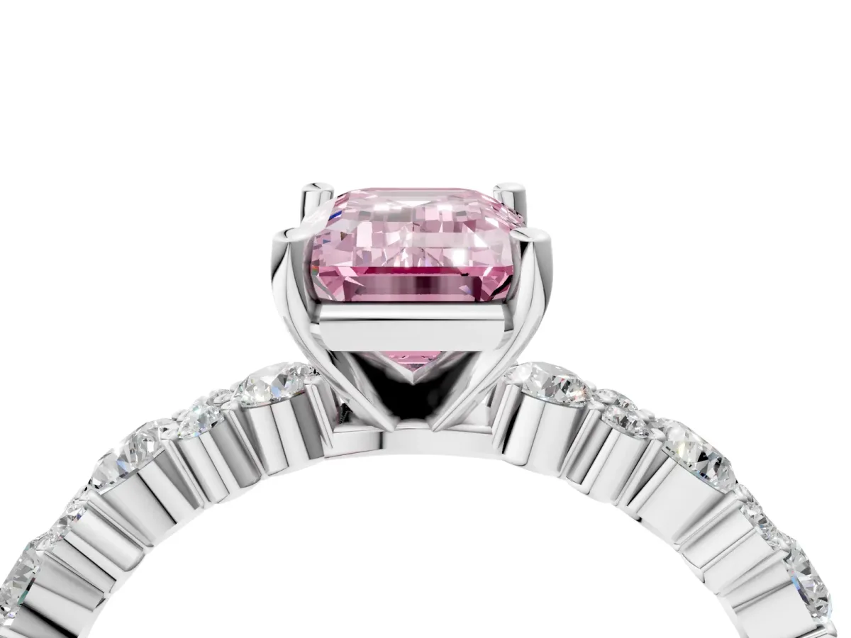 Fancy Pink Emerald Cut Diamond Side Stone Solitaire Ring with Round and Four-Prong Setting Platinum