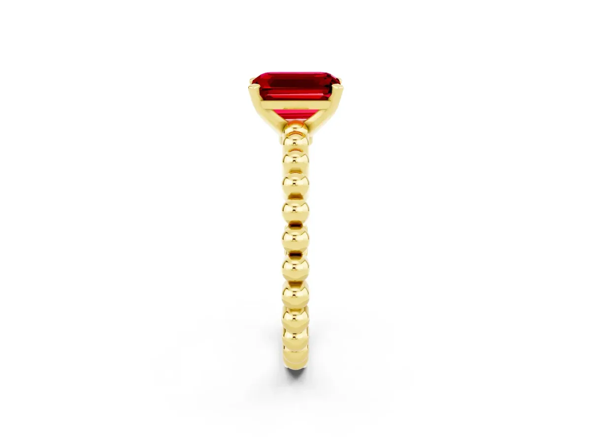 Emerald Cut Ruby Solitaire Ring with Beaded Band and Prong Setting Yellow gold