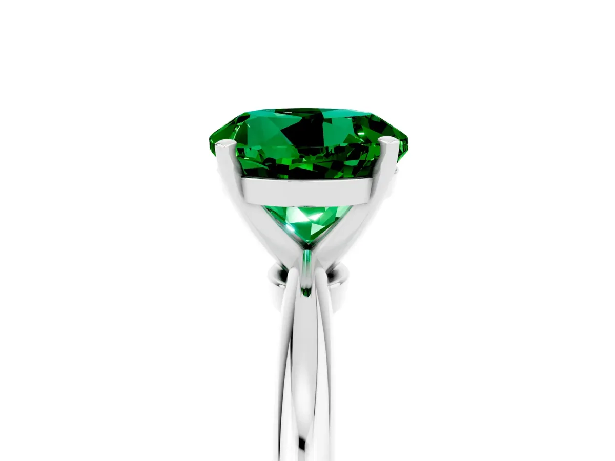 Round Cut Emerald Solitaire Ring with Six-Prong Setting and Classic Band Platinum