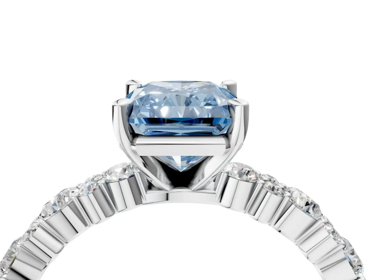 Fancy Blue Radiant Cut Diamond Side Stone Solitaire Ring with Round and Four-Prong Setting Platinum
