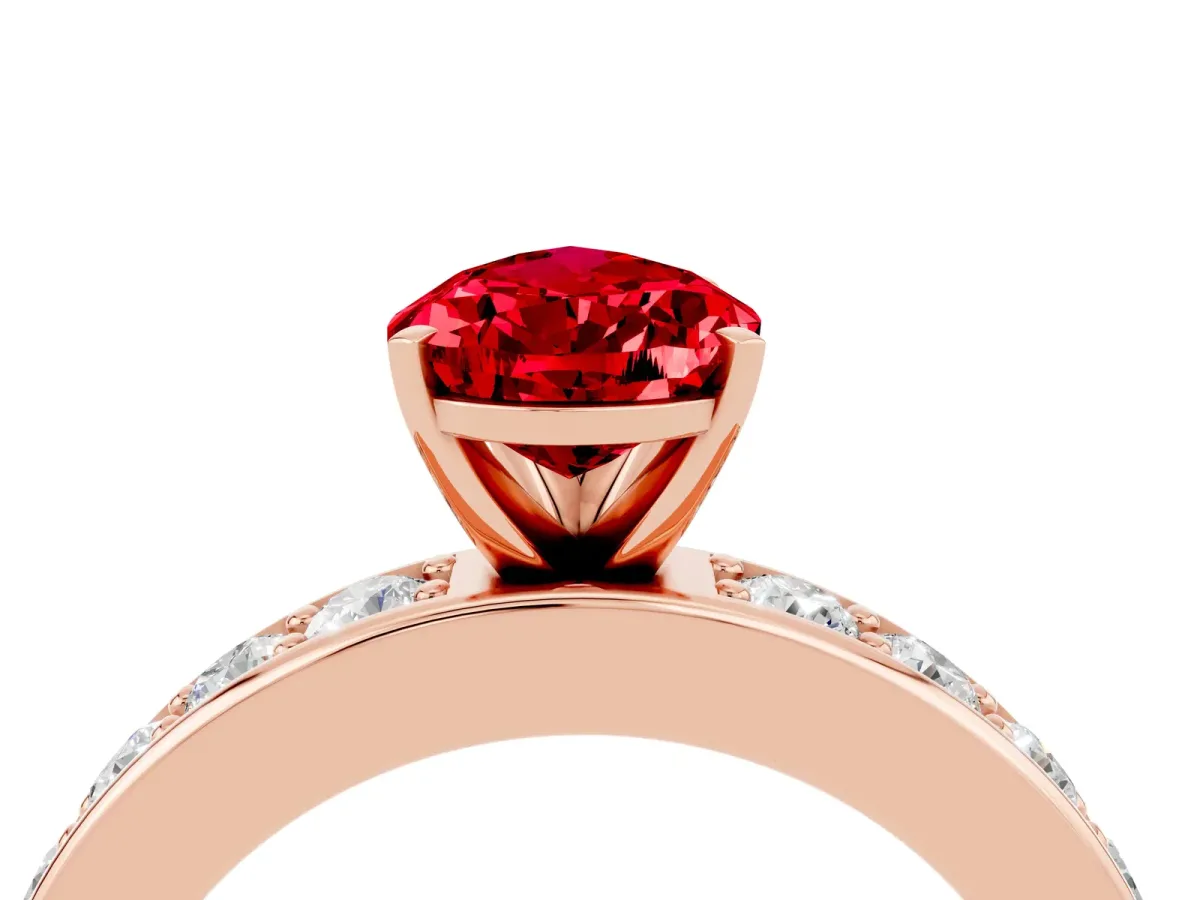 Pear Cut Ruby Engagement Ring with Channel Set Round Band and Prong Setting Rose gold