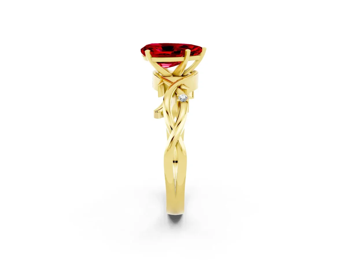 Pear Cut Ruby Solitaire Ring with Twisted Band and Prong Setting Yellow gold