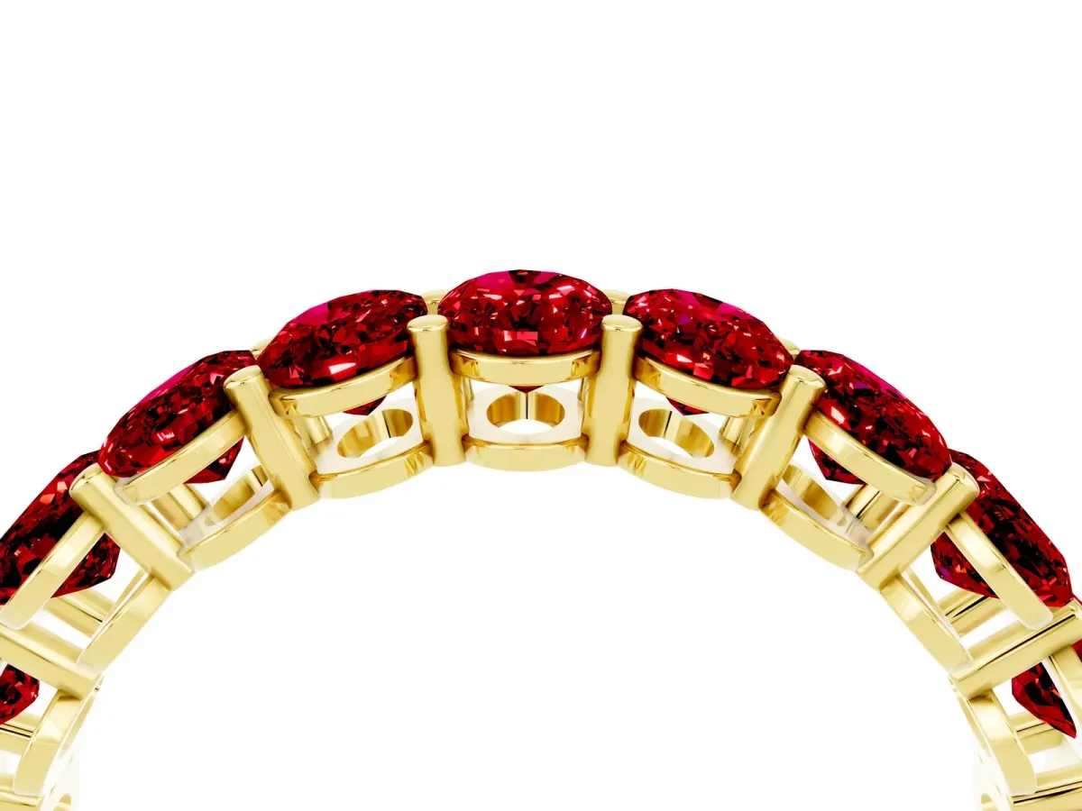 Oval Cut Ruby Eternity Band with Shared Prong Setting Yellow gold