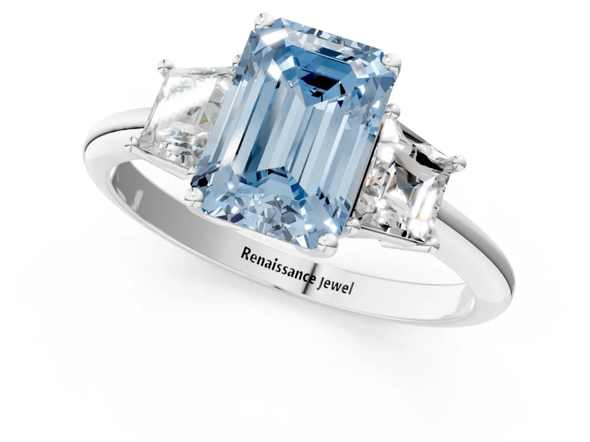 Fancy Blue Emerald Cut Diamond Three-Stone Ring with Trapezoid Side Stones and Prong Setting Silver