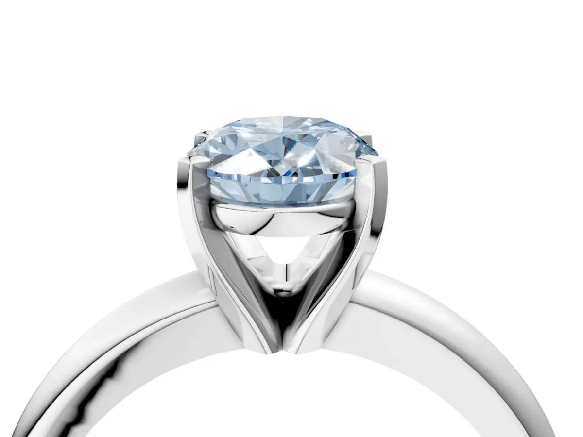 Fancy Blue Oval Cut Diamond Solitaire Engagement Ring with Round Band and Four-Prong Setting Silver