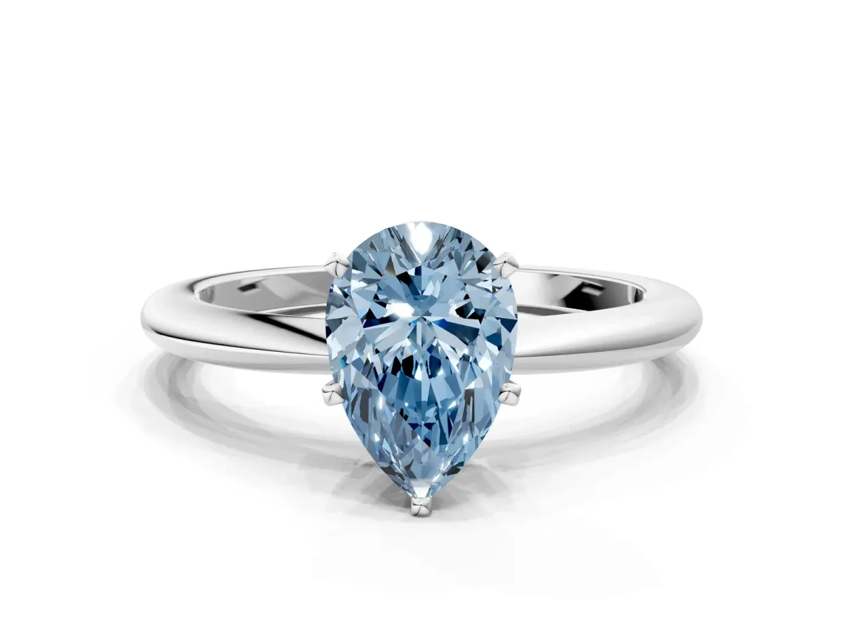 Fancy Blue Pear Cut Diamond Solitaire Ring with Six-Prong Setting and Classic Band Platinum