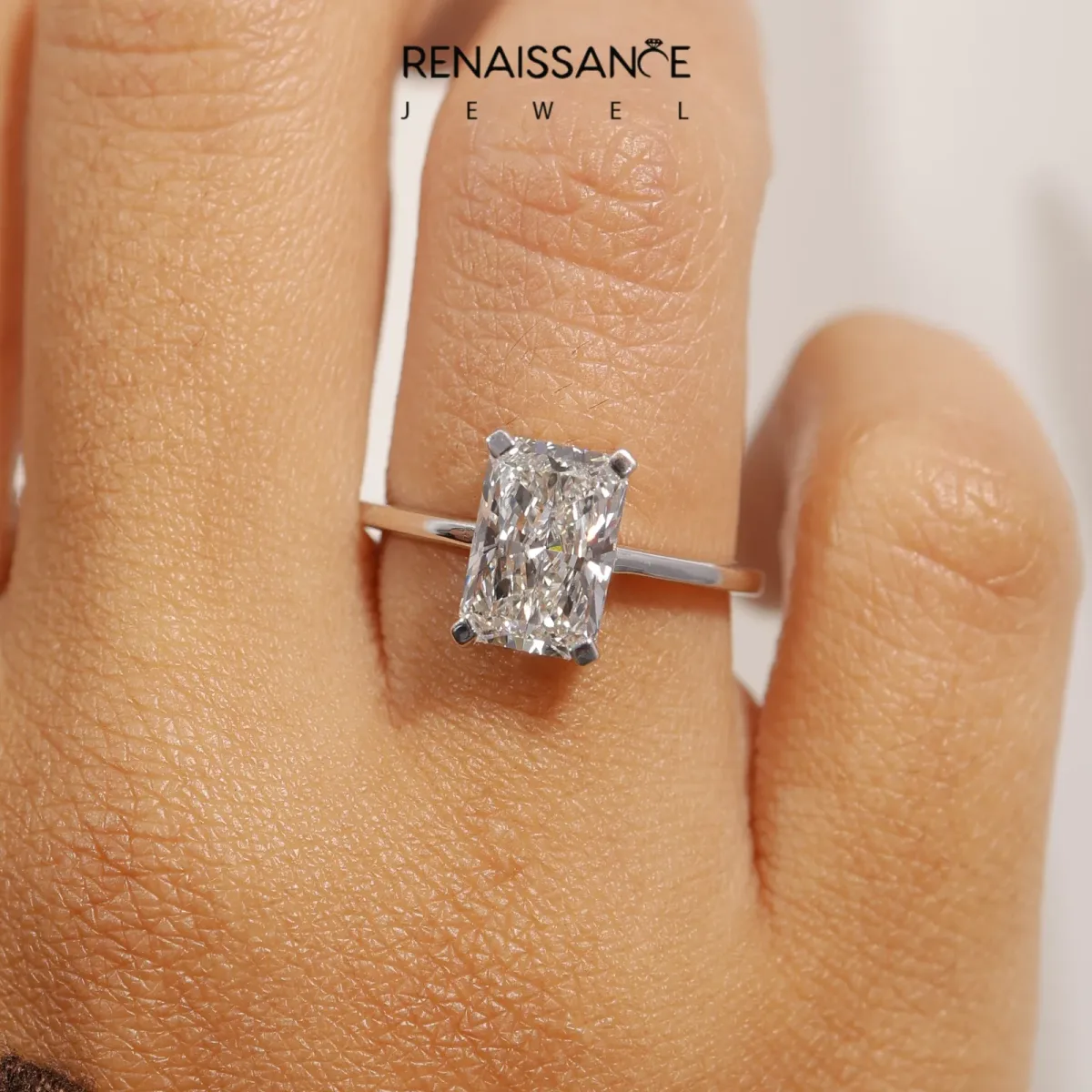 Radiant Cut Cut Solitaire Ring with Four-Prong Setting and Classic Band Platinum