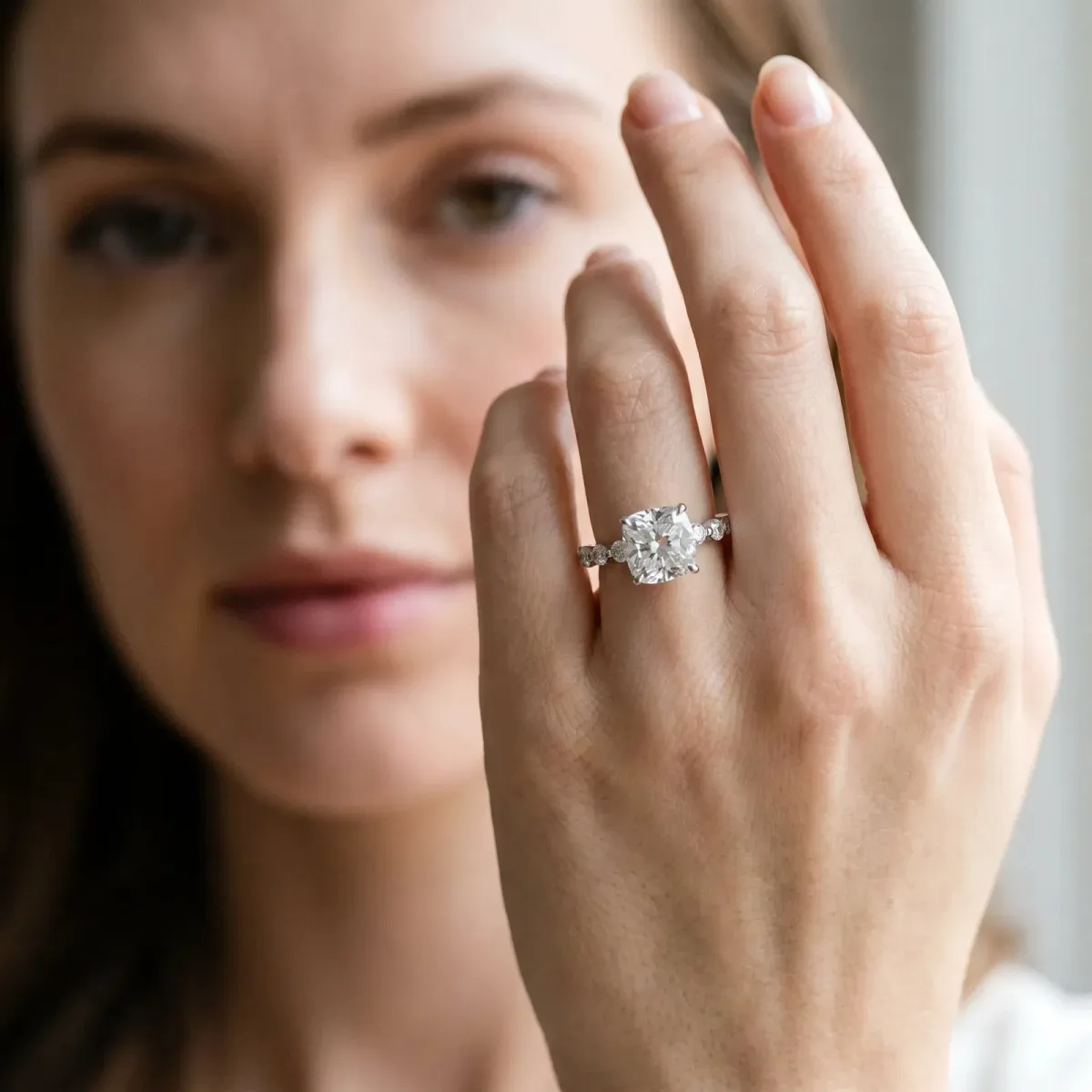 Cushion Cut Solitaire Diamond Ring with Pave Band and Four-Prong Setting Silver