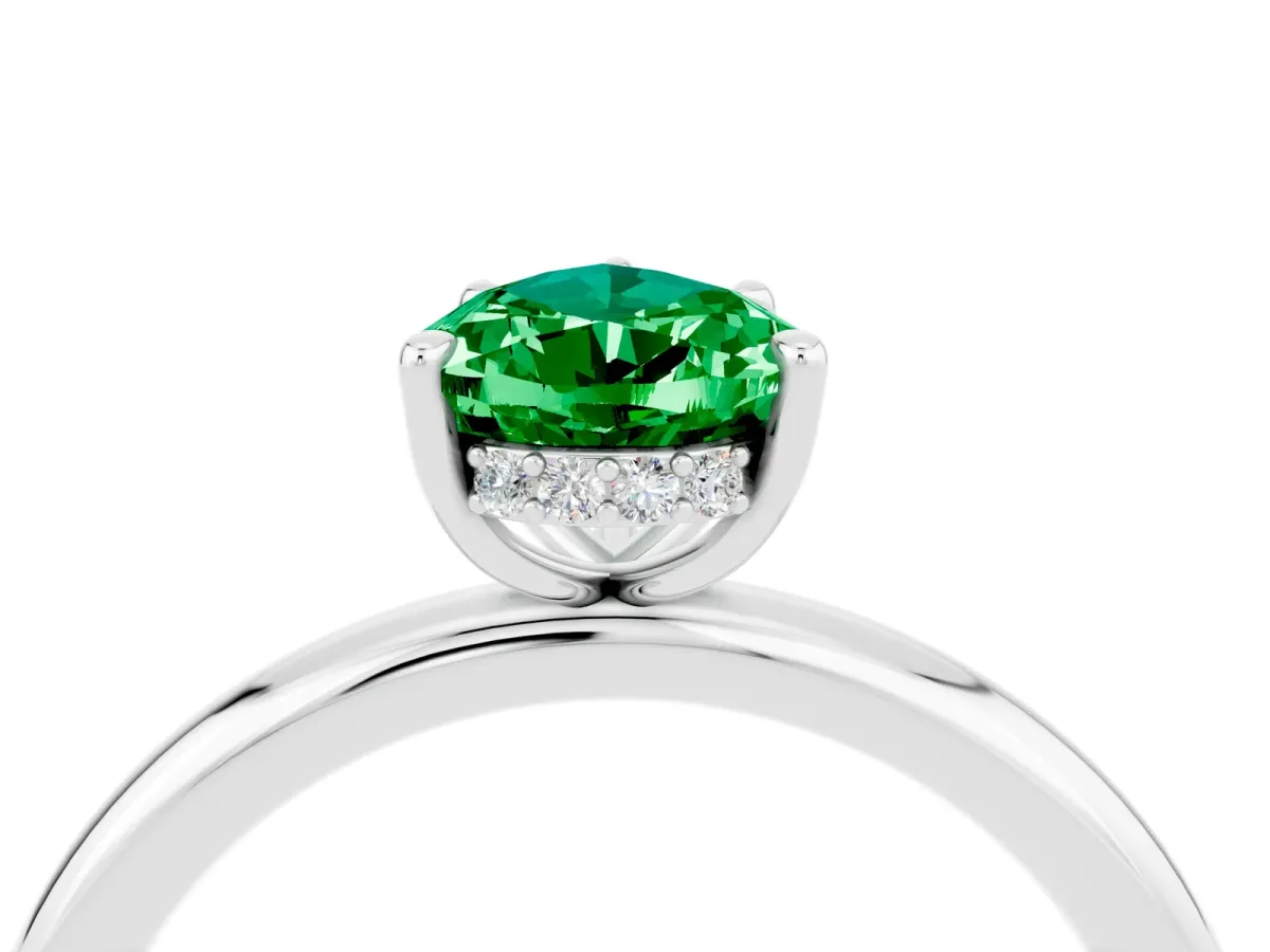 Pear Cut Emerald Solitaire Ring with Thin Band and Four-Prong Setting Silver
