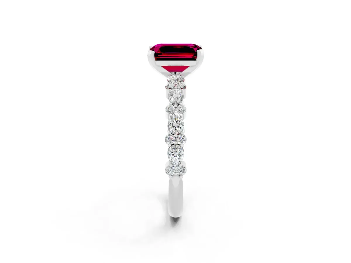 Emerald Cut Garnet Side Stone Solitaire Ring with Round and Four-Prong Setting White gold
