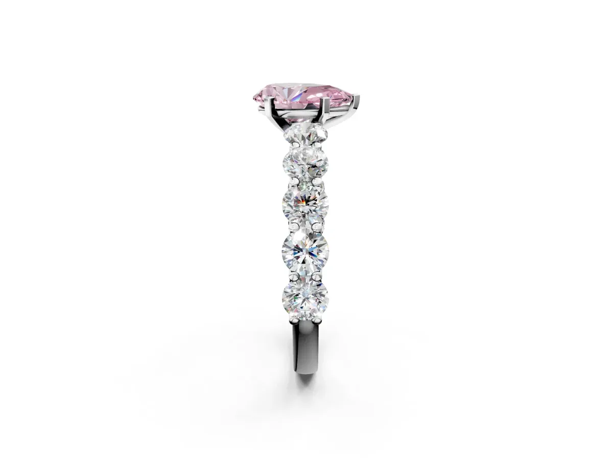Fancy Pink Pear Cut Diamond Prong Setting with Side Stones on a Pave Band Silver