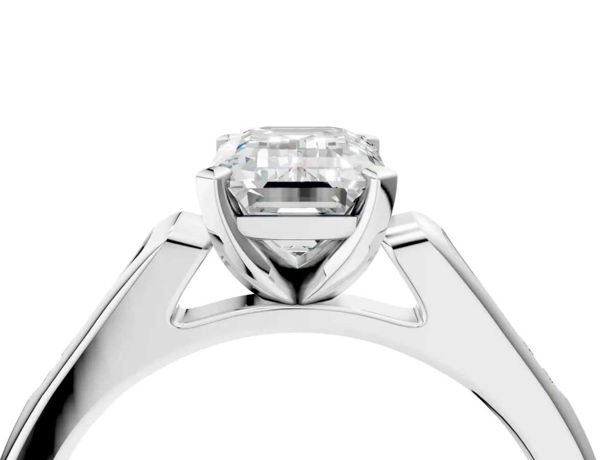 Emerald Cut Diamond Solitaire Ring with Channel Set Round Band and Prong Setting Silver