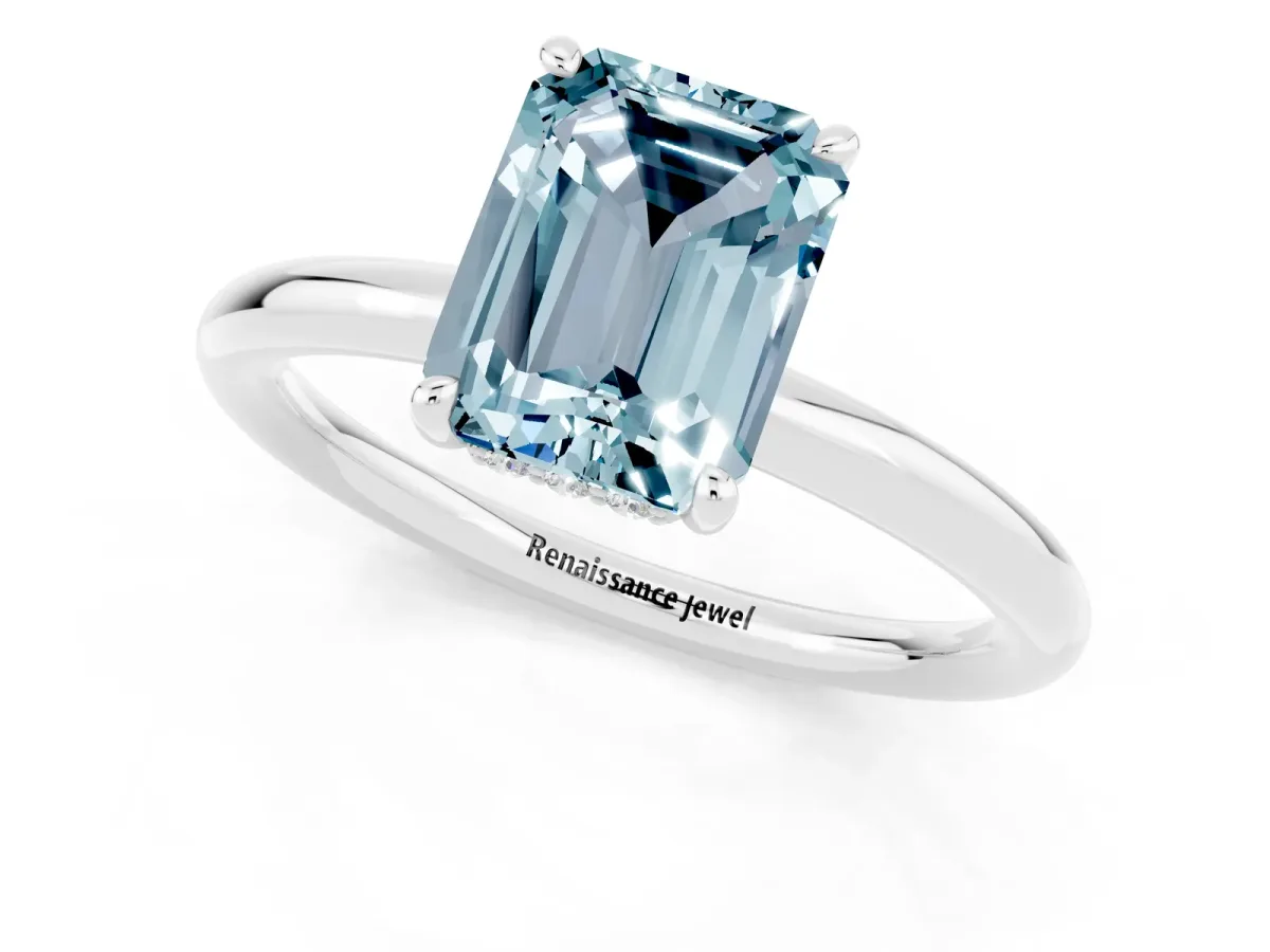 Emerald Cut Aquamarine Solitaire Ring with Thin Band and Four-Prong Setting White gold