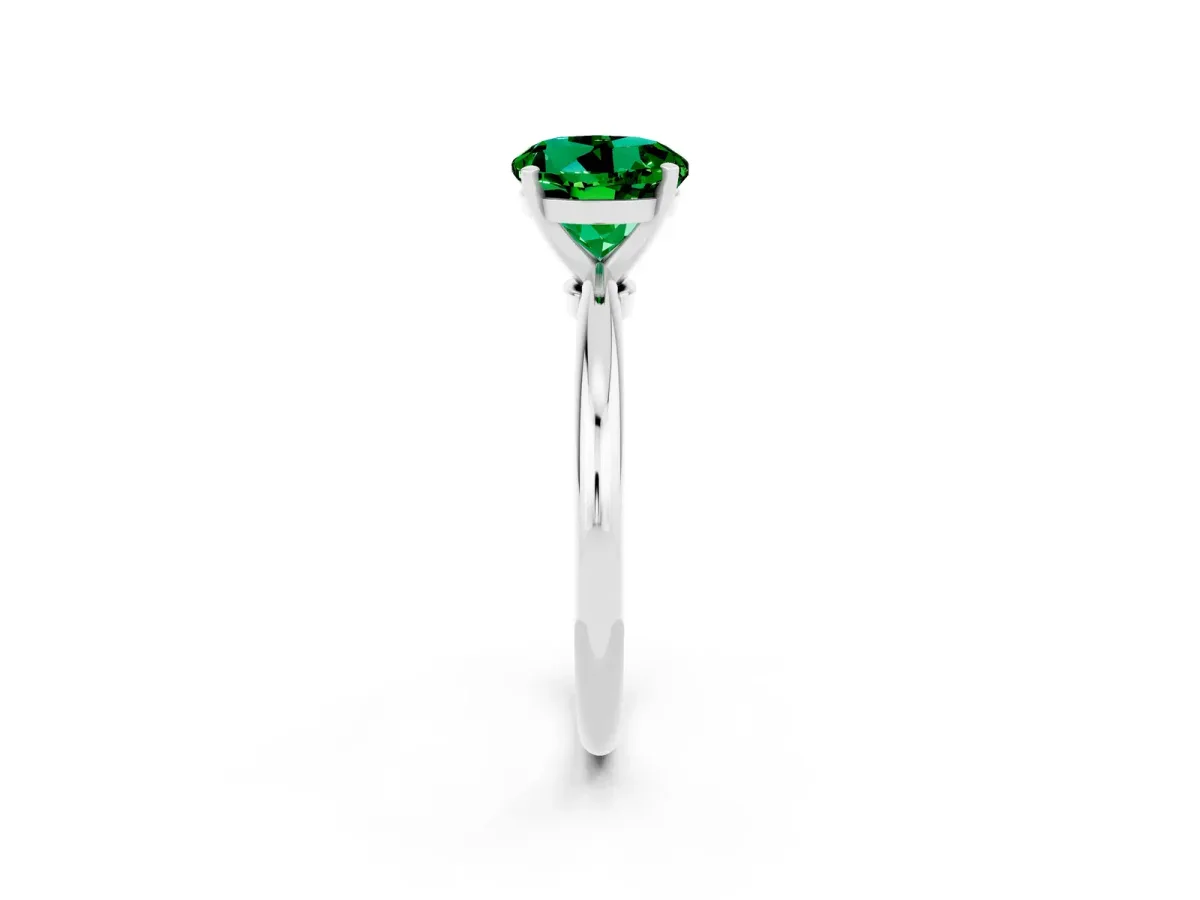 Round Cut Emerald Solitaire Ring with Six-Prong Setting and Classic Band Platinum