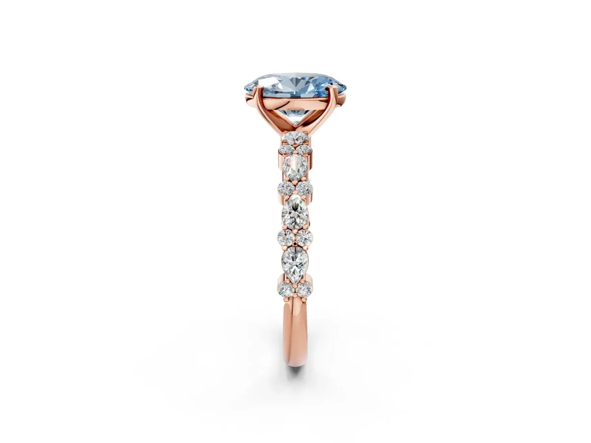 Fancy Blue Oval Cut Diamond Side Stone Solitaire Ring with Round and Four-Prong Setting Rose gold
