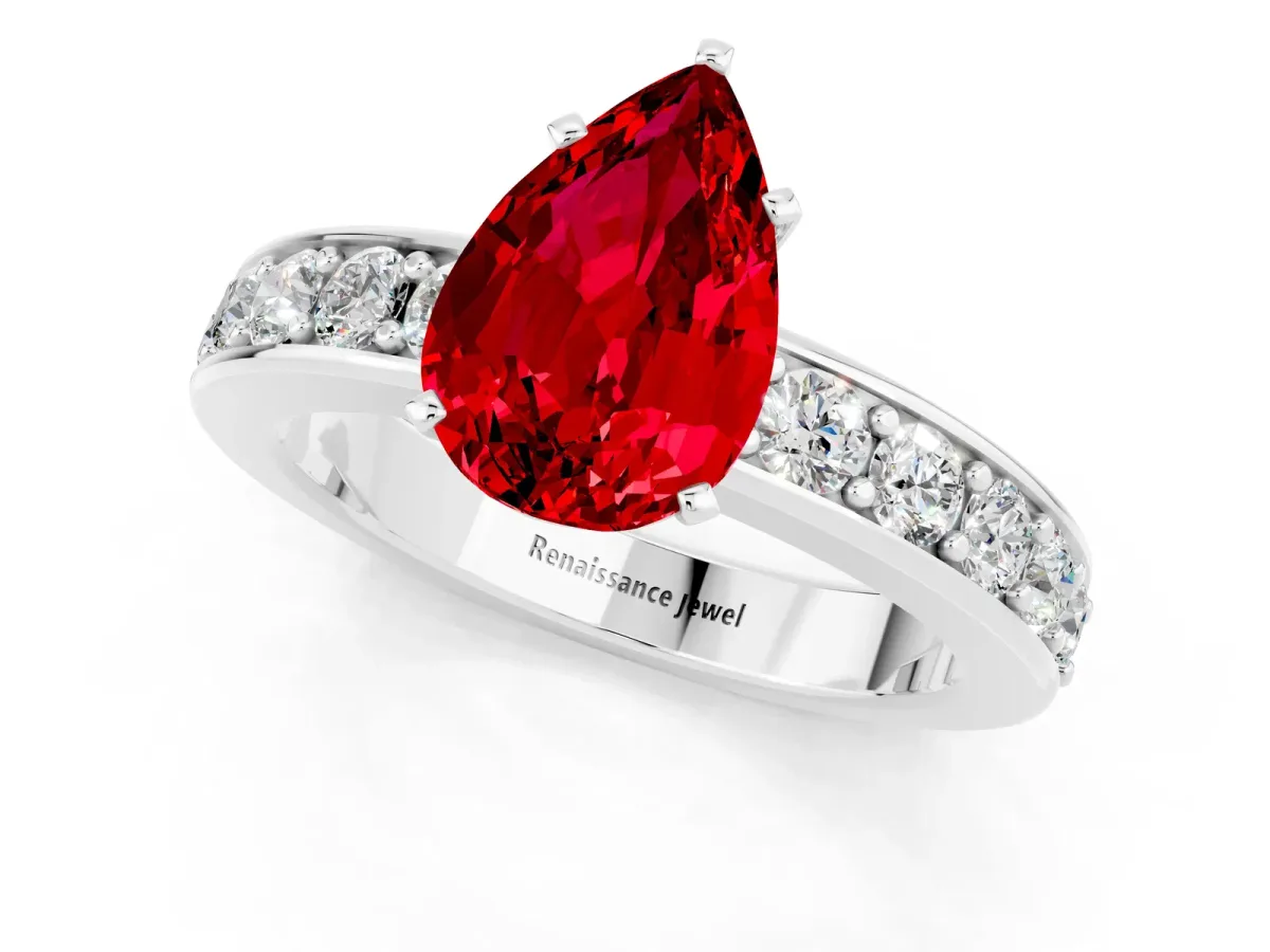 Pear Cut Ruby Engagement Ring with Channel Set Round Band and Prong Setting White gold
