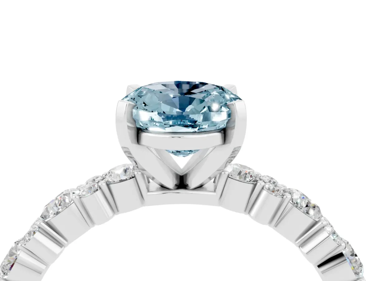 Oval Cut Aquamarine Side Stone Solitaire Ring with Round and Four-Prong Setting Platinum