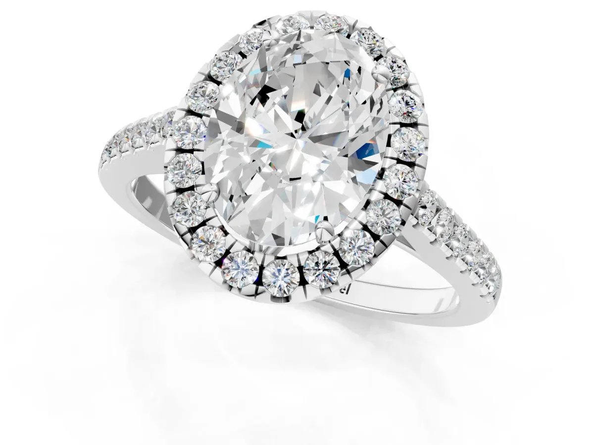 Oval Cut Halo Pavé Diamond Engagement Ring with Four-Prong Setting Silver