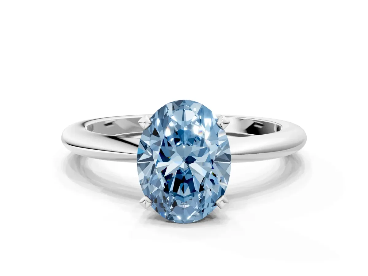Fancy Blue Oval Cut Diamond Solitaire Ring with Six-Prong Setting and Classic Band Platinum