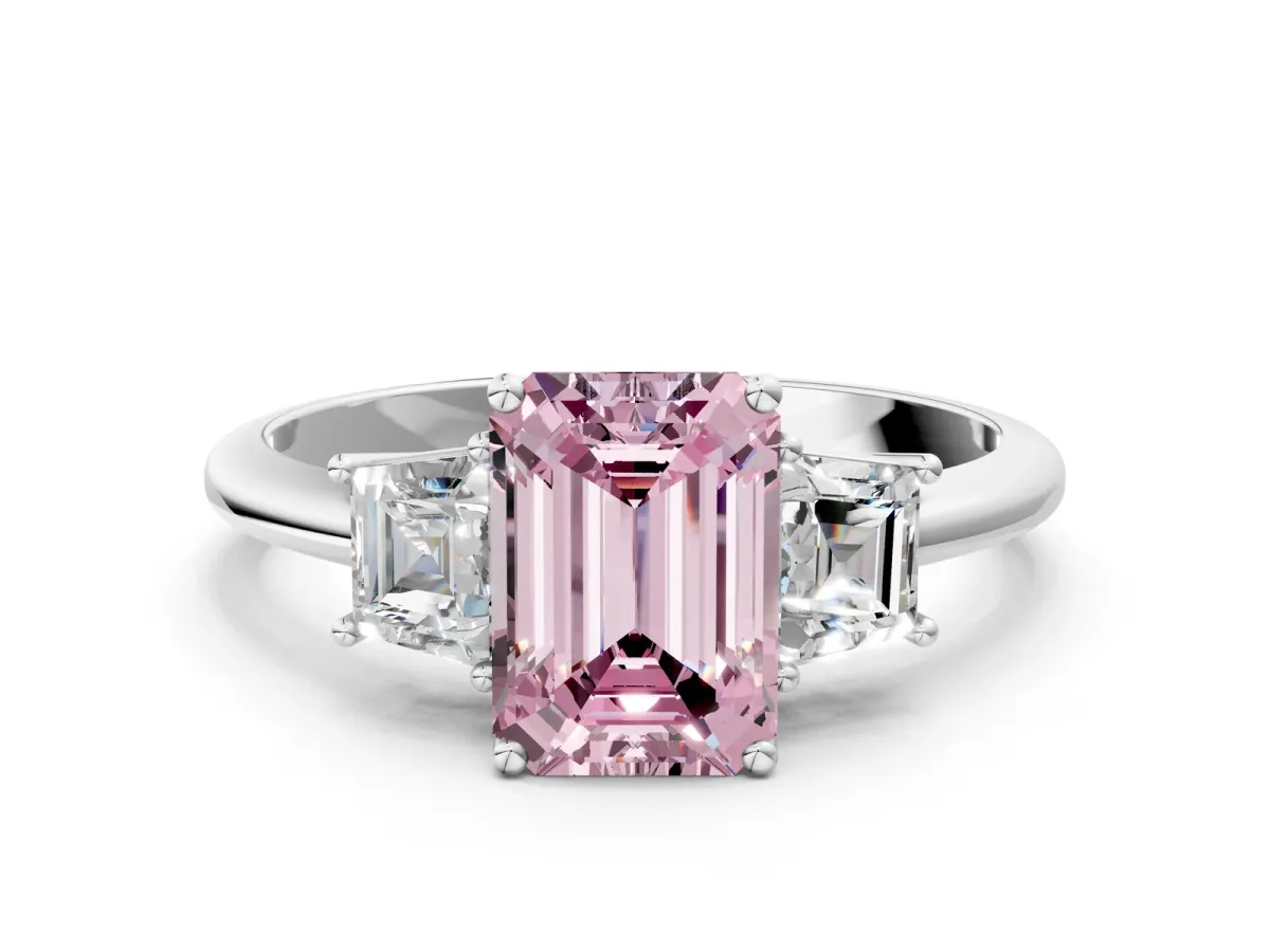 Fancy Pink Emerald Cut Diamond Three-Stone Ring with Trapezoid Side Stones and Prong Setting Platinum