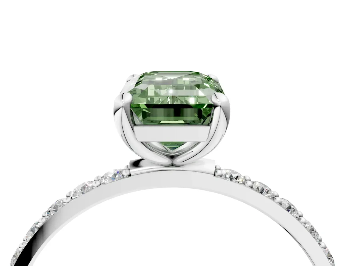 Fancy Green Emerald Cut Diamond Solitaire Ring with Round Pavé Band and Prong Setting Silver