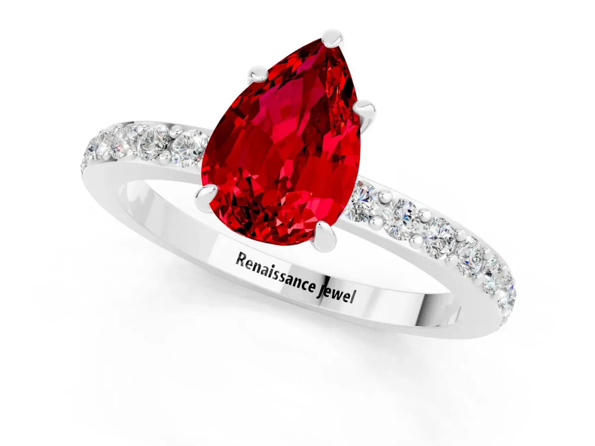Pear Cut Ruby Solitaire Engagement Ring with Pavé Band and Four-Prong Setting White gold