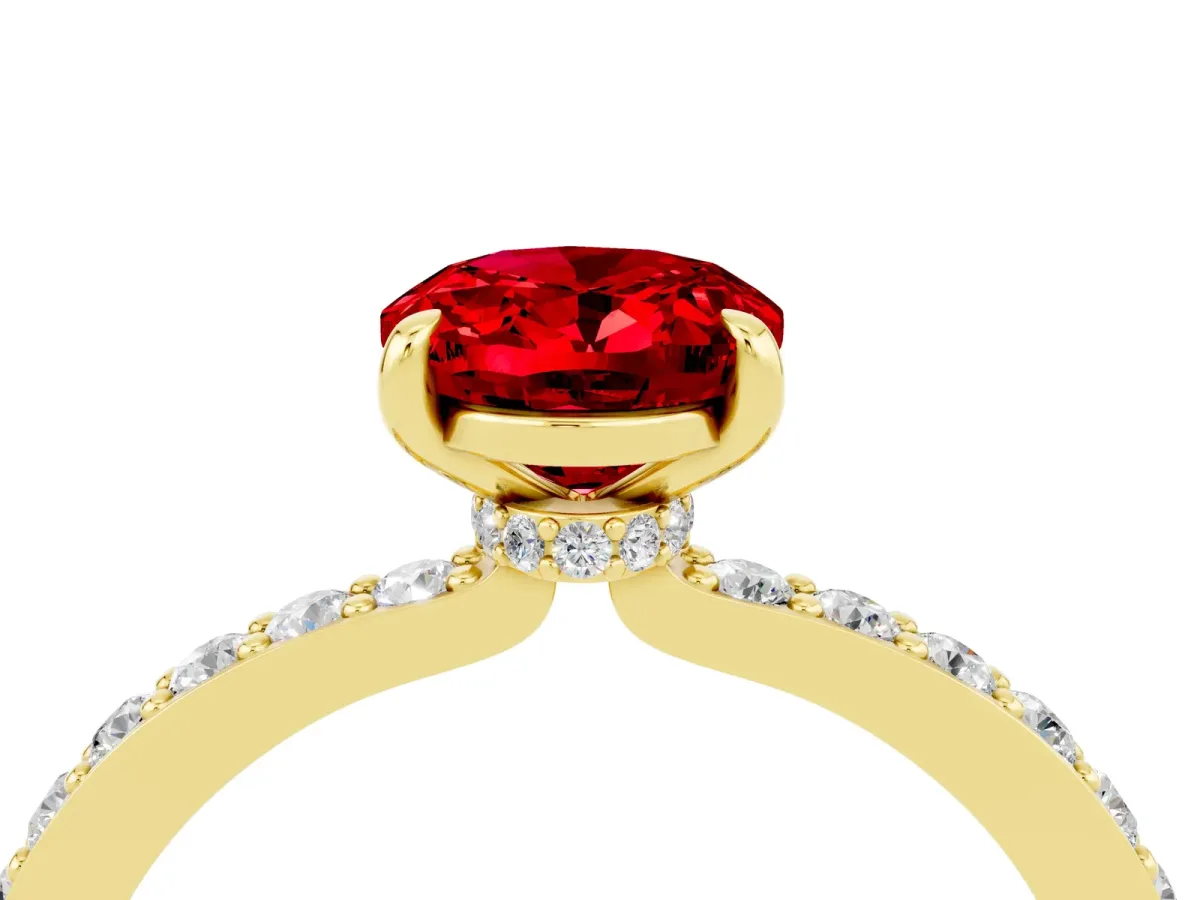 Oval Cut Ruby Solitaire Engagement Ring with Pavé Band and Four-Prong Setting Yellow gold