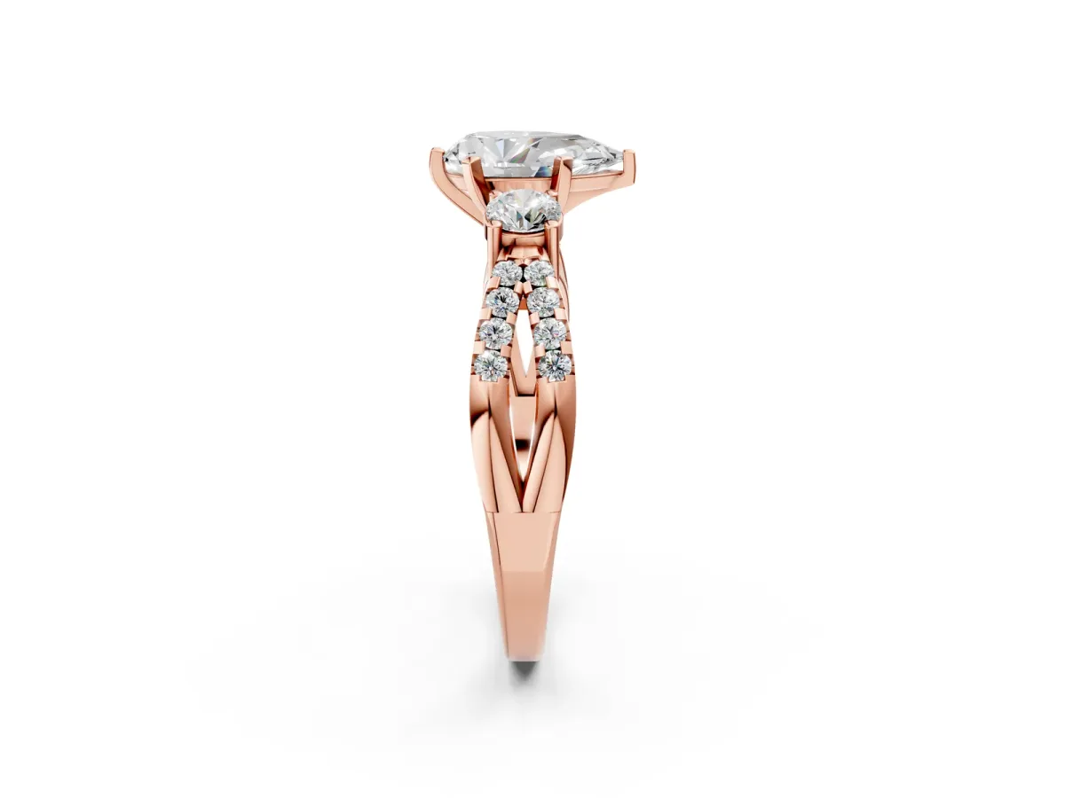 Pear Cut Diamond Three-Stone Ring with Pavé Split Shank and Four-Prong Setting Rose gold