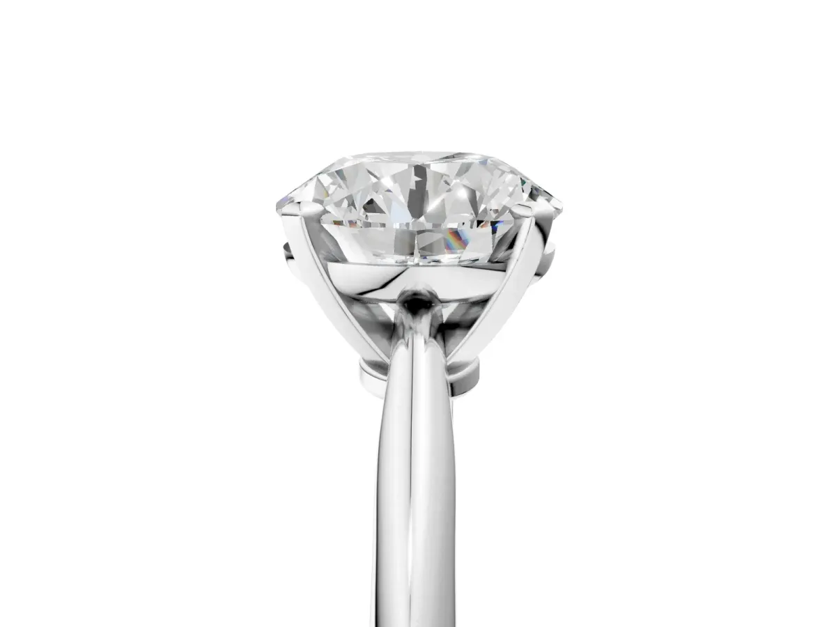 Round Cut Diamond Solitaire Engagement Ring with Classic Band and Four-Prong Setting Silver