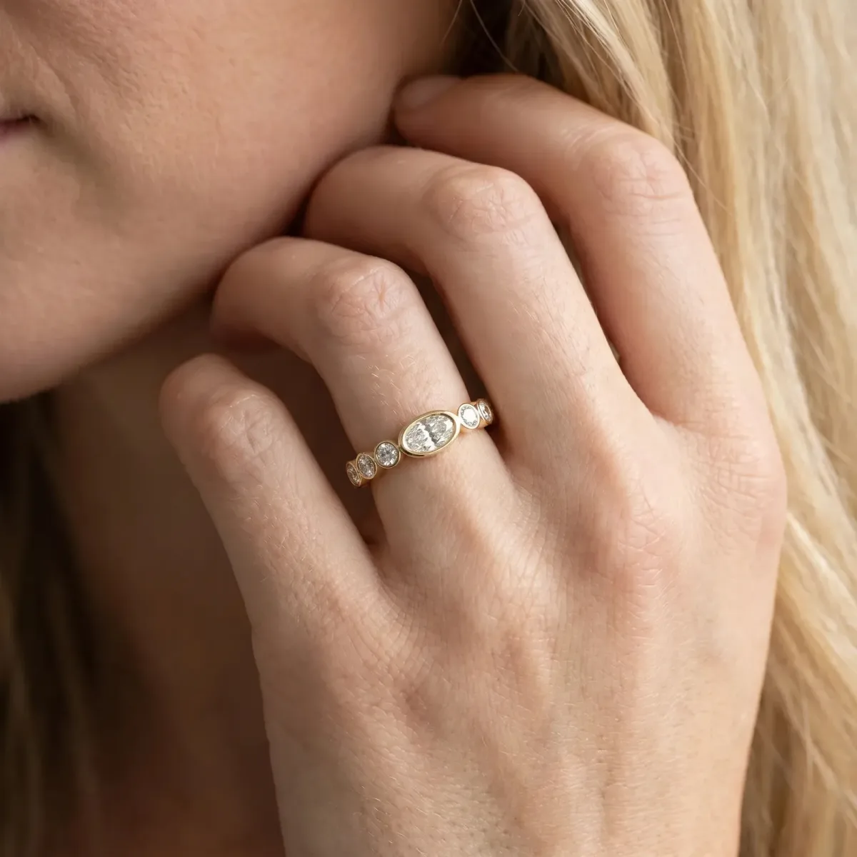 Bezel Set Oval Diamond Half Eternity Band Yellow gold