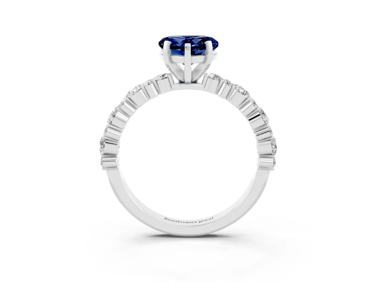 Heart Cut Blue Sapphire Side Stone Solitaire Ring with Round and Four-Prong Setting Platinum