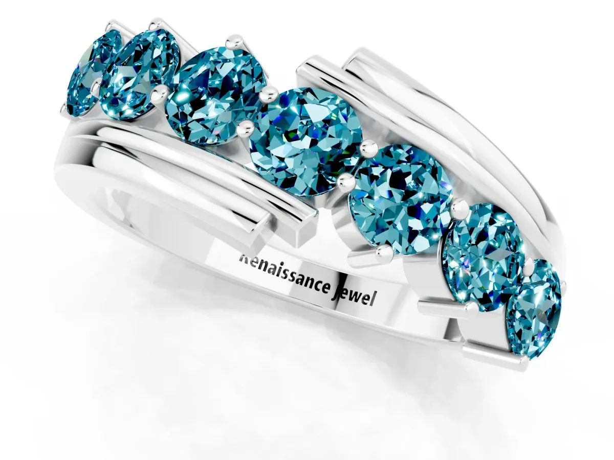 Round Blue Topaz Wave Band with Channel and Shared Prong Setting Silver