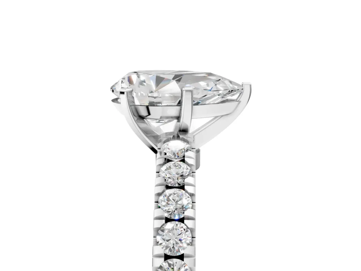 Pear Cut Solitaire Diamond with Pavé Band and Four-Prong Setting Silver