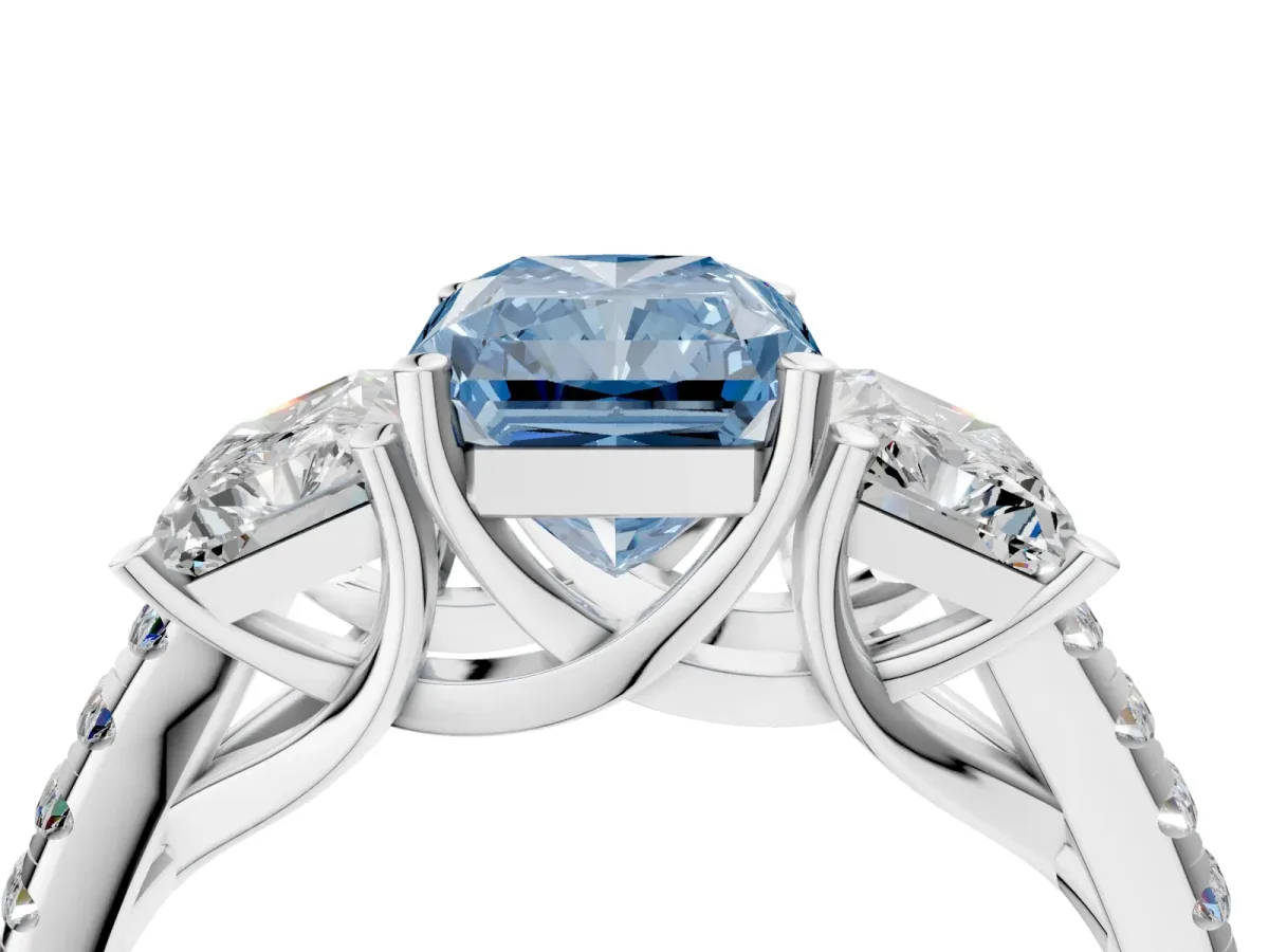 Fancy Blue Three-Stone Radiant Cut Diamond Ring with Round Pavé Band and Prong Setting Silver