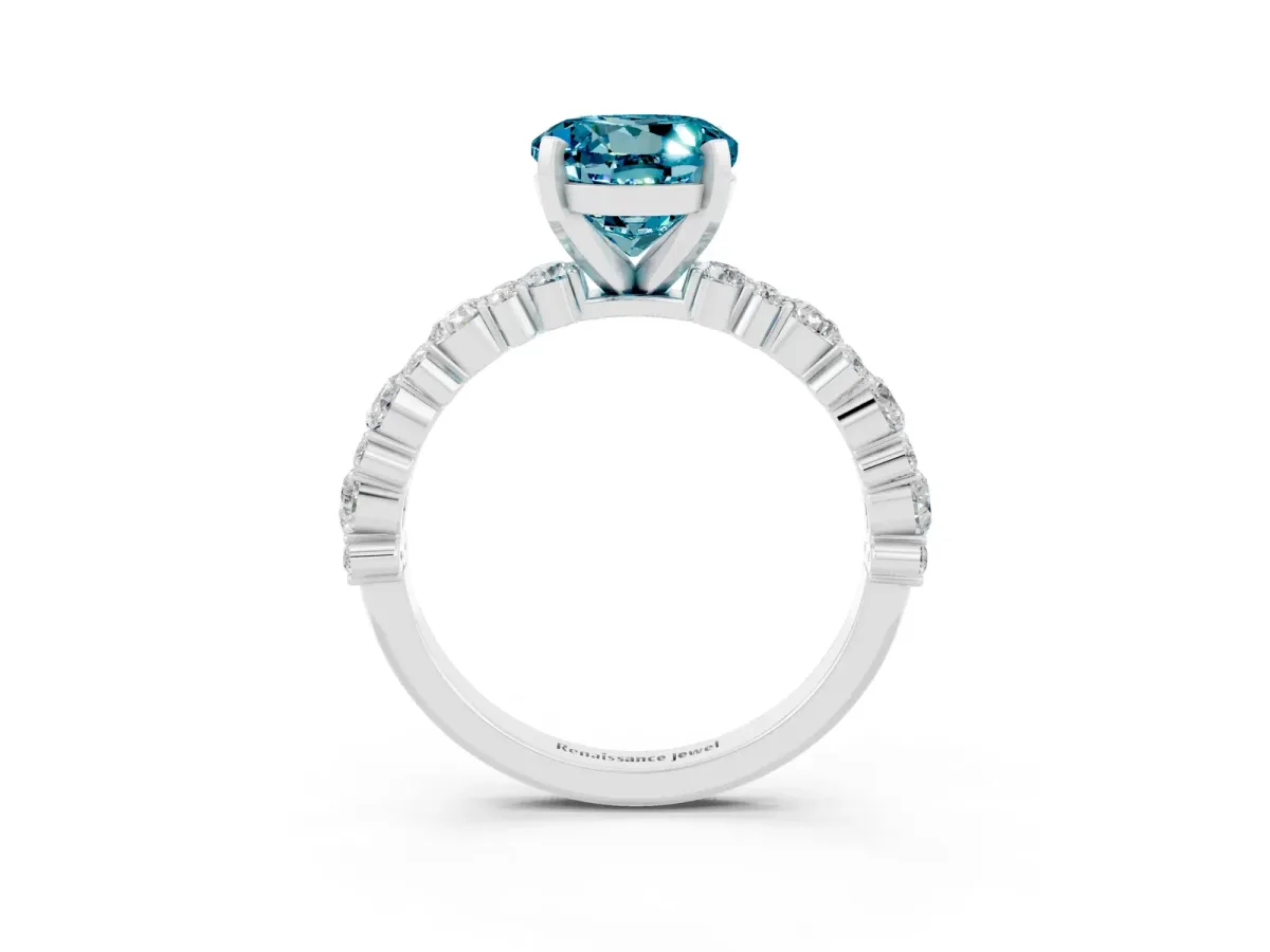 Round Cut Blue Topaz Side Stone Solitaire Ring with Round and Four-Prong Setting Silver