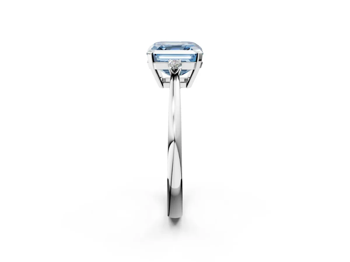 Fancy Blue Asscher Cut Cut Three-Stone Solitaire Ring with Round Accent Diamonds and Four-Prong Setting Platinum