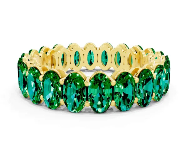 Oval Cut Emerald Eternity Band with Shared Prong Setting Yellow gold