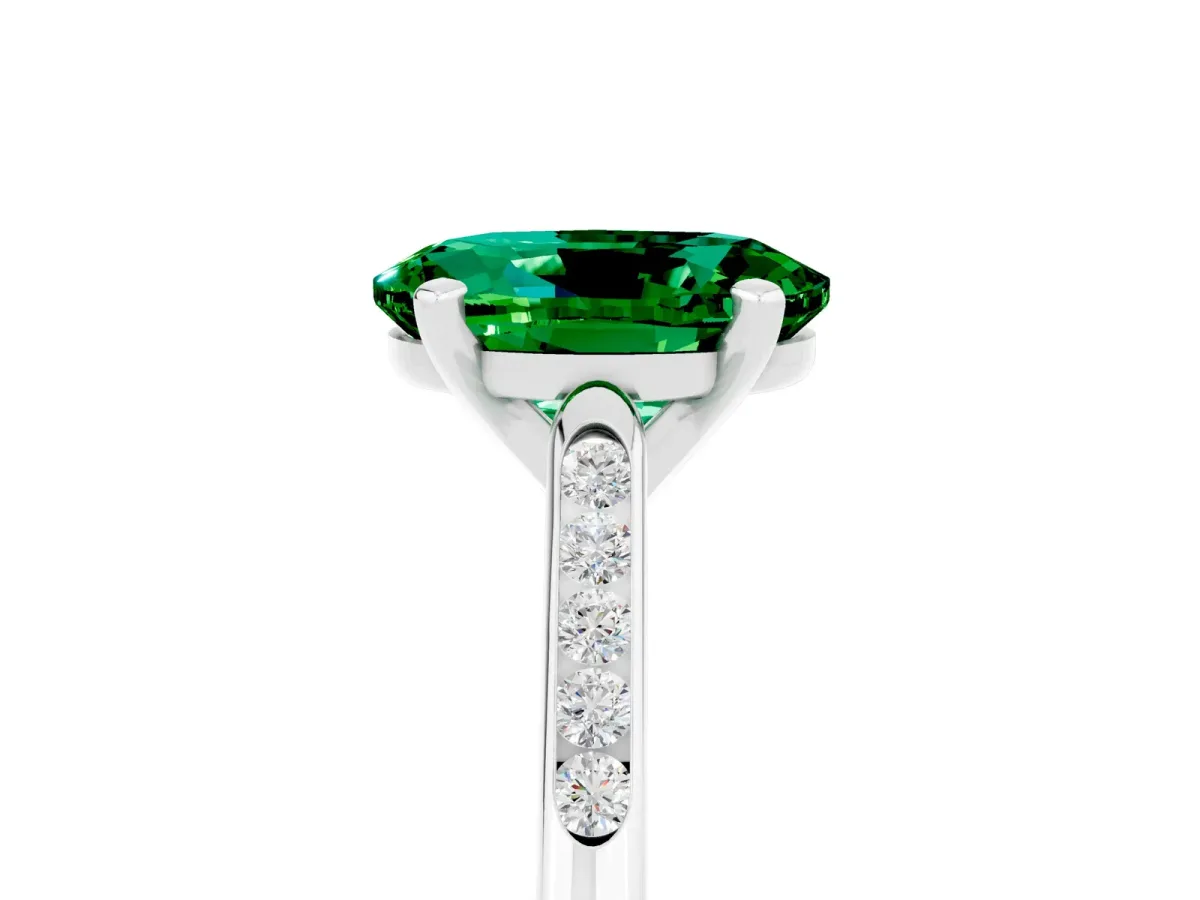 Oval Cut Emerald Solitaire Ring with Channel Set Round Band and Prong Setting White gold