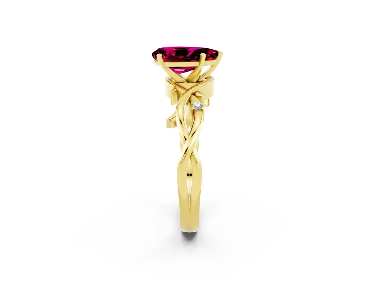 Pear Cut Garnet Solitaire Ring with Twisted Band and Prong Setting Yellow gold